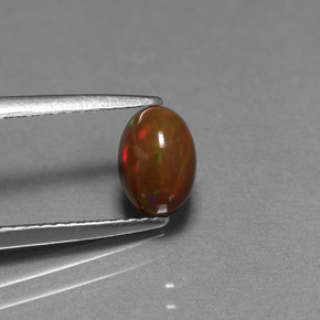 0.77 ct Multicolor Chocolate Opal Gemstone, Chocolate Opal Gem in Oval Cabochon Shape for Sale.