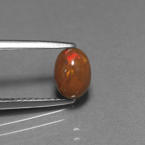 0.69 ct Multicolor Chocolate Opal Gemstone, Chocolate Opal Gem in Oval Cabochon Shape for Sale.