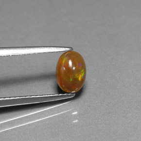 0.54 ct Multicolor Chocolate Opal Stone, Natural Chocolate Opal in Oval Cabochon Shape for Sale