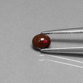 0.32 ct Multicolor Chocolate Opal Gemstone, Chocolate Opal Gem in Oval Cabochon Shape for Sale.