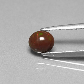 0.44 ct Multicolor Chocolate Opal Gemstone, Chocolate Opal Gem in Oval Cabochon Shape for Sale.
