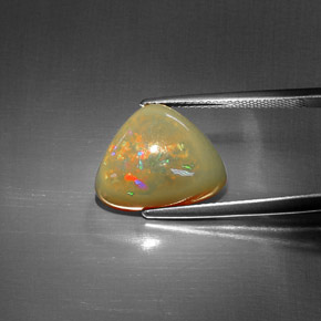 5.44 ct Multicolor Chocolate Opal Gemstone, Chocolate Opal Gem in Trillion Cabochon Shape for Sale.