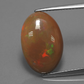 4.08 ct Multicolor Chocolate Opal Gemstone, Chocolate Opal Gem in Oval Cabochon Shape for Sale.