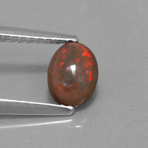 0.41 ct Multicolor Chocolate Opal Gemstone, Chocolate Opal Gem in Oval Cabochon Shape for Sale.