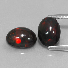 1.73 ct Multicolor Chocolate Opal Gemstone, Chocolate Opal Gem in Oval Cabochon Shape for Sale.