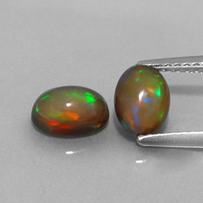 1.23 ct Multicolor Chocolate Opal Gemstone, Chocolate Opal Gem in Oval Cabochon Shape for Sale.