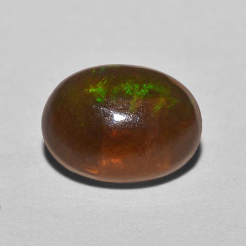 0.57ct Oval Multicolor Chocolate Opal from Ethiopia, Dimension 8.1 x 6.1mm, Natural untreated Gemstone, Translucent Clarity, 1pc Oval Cabochon Chocolate Opal, Mohs Hardness of 5.5 - 6.5, Photo A