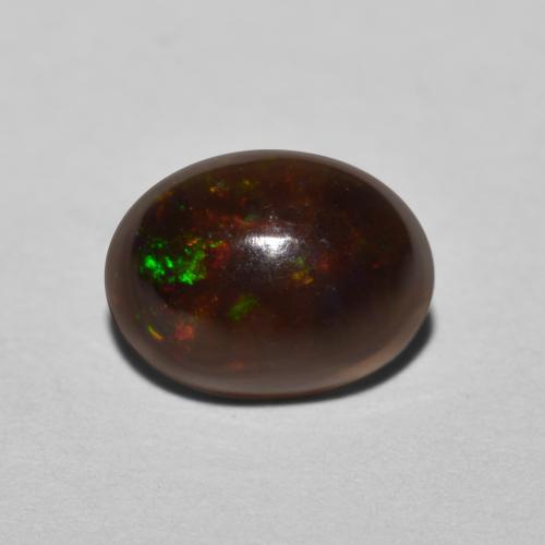 Multicolore Opale Chocolat gemme - 0.7ct Ovale Cabochon (ID: 573121)