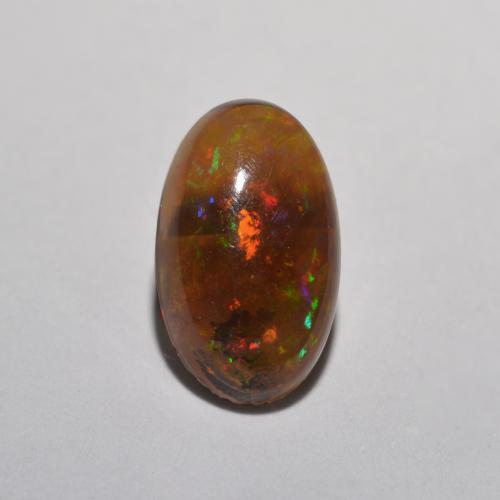 Многоцветный Шоколадный Опал Камень - 0.4ct Овал Кабошон (ID: 573431)