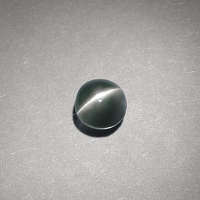 0.65 ct Green Chrysoberyl Cat's Eye Gemstone, Chrysoberyl Cat's Eye Gem in Round Cabochon Shape for Sale.