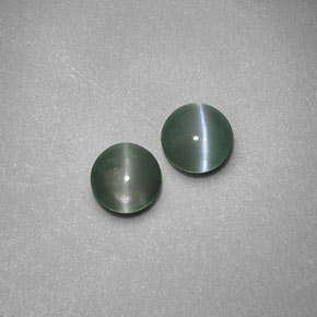 0.74 ct Green Chrysoberyl Cat's Eye Gemstone, Chrysoberyl Cat's Eye Gem in Round Cabochon Shape for Sale.
