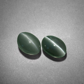 1.79 ct Green Chrysoberyl Cat's Eye Gemstone, Chrysoberyl Cat's Eye Gem in Oval Cabochon Shape for Sale.