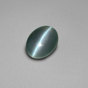 0.69 ct Green Chrysoberyl Cat's Eye Gemstone, Chrysoberyl Cat's Eye Gem in Oval Cabochon Shape for Sale.