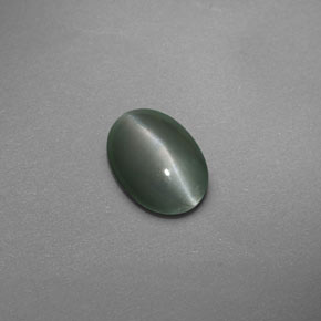 0.59 ct Green Chrysoberyl Cat's Eye Gemstone, Chrysoberyl Cat's Eye Gem in Oval Cabochon Shape for Sale.