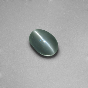 0.86 ct Green Chrysoberyl Cat's Eye Gemstone, Chrysoberyl Cat's Eye Gem in Oval Cabochon Shape for Sale.