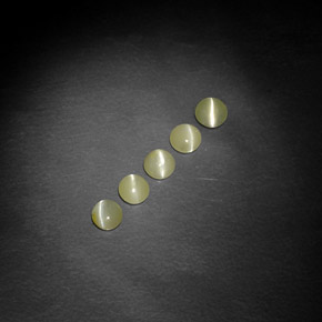 1.25 ct Green Chrysoberyl Cat's Eye Gemstone, Chrysoberyl Cat's Eye Gem in Round Cabochon Shape for Sale.