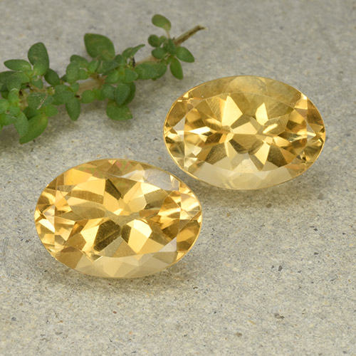 14,1 x 10mm Oval Citrin-Paar - Gewicht 11,7 ct gesamt / durchschnittl. 5,85 ct, Garantiert natürliche Edelsteine, Gold-orange Farbe in VVS-VS Reinheit, Mohs-Härte 7 Geeignet für den täglichen Gebrauch im Schmuck, November Geburtsstein, Photo A