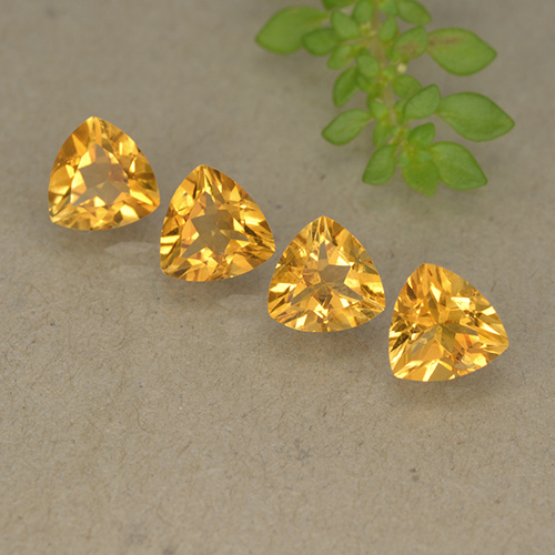 Deep Golden Orange Цитрин Камень - 0.7ct Огранка Триллион Фасетная (ID: 499333)