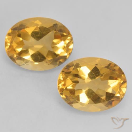 2 Stück ovaler goldener Citrin in der Größe 9 x 7mm, Gewicht 3,57 ct gesamt / durchschn. Je 1,79 ct, Mittel-Dunkelgold in VVS-VS Reinheit, Natürlicher Edelstein, Mohs-Härte 7 Geeignet für den täglichen Gebrauch im Schmuck , Sternzeichen Löwe, Photo A