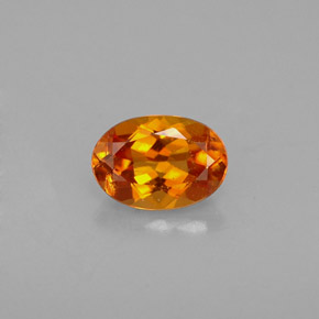 0.48 ct Orange Clinohumite Gemstone, Clinohumite Gem in Oval Facet Shape for Sale.
