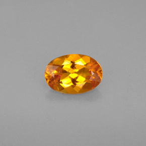 0.67 ct Orange Clinohumite Gemstone, Clinohumite Gem in Oval Facet Shape for Sale.