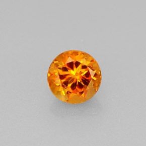 0.64 ct Orange Clinohumite Gemstone, Clinohumite Gem in Round Facet Shape for Sale.