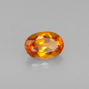 0.56 ct Orange Clinohumite Stone, Natural Clinohumite in Oval Facet Shape for Sale