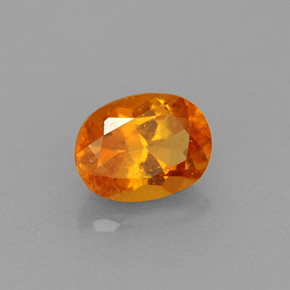 0.75 ct Orange Clinohumite Stone, Natural Clinohumite in Oval Facet Shape for Sale
