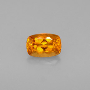 0.59 ct Orange Clinohumite Gemstone, Clinohumite Gem in Cushion-Cut Shape for Sale.