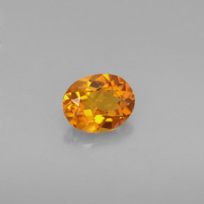 0.54 ct Orange Clinohumite Gemstone, Clinohumite Gem in Oval Facet Shape for Sale.