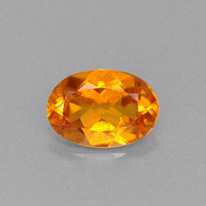 0.66 ct Orange Clinohumite Gemstone, Clinohumite Gem in Oval Facet Shape for Sale.