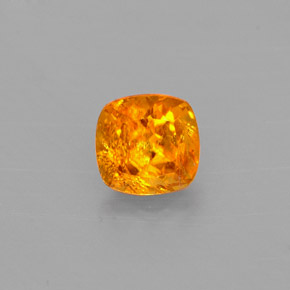 0.60 ct Orange Clinohumite Gemstone, Clinohumite Gem in Cushion-Cut Shape for Sale.