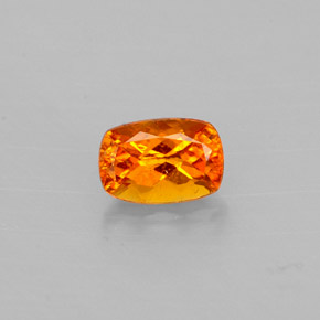 0.59 ct Orange Clinohumite Gemstone, Clinohumite Gem in Cushion-Cut Shape for Sale.
