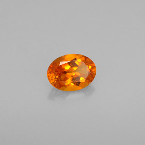 0.50 ct Orange Clinohumite Stone, Natural Clinohumite in Oval Facet Shape for Sale