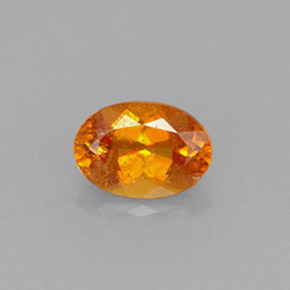 0.56 ct Orange Clinohumite Gemstone, Clinohumite Gem in Oval Facet Shape for Sale.