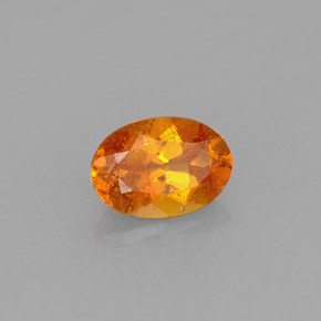 0.56 ct Orange Clinohumite Stone, Natural Clinohumite in Oval Facet Shape for Sale