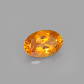 0.61 ct Orange Clinohumite Stone, Natural Clinohumite in Oval Facet Shape for Sale