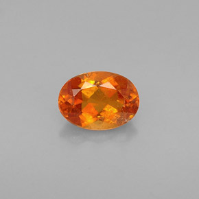 0.64 ct Orange Clinohumite Gemstone, Clinohumite Gem in Oval Facet Shape for Sale.