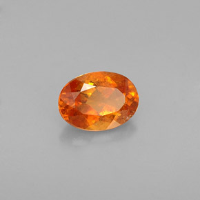 0.64 ct Orange Clinohumite Stone, Natural Clinohumite in Oval Facet Shape for Sale