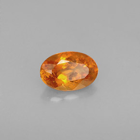 0.64 ct Orange Clinohumite Stone, Natural Clinohumite in Oval Facet Shape for Sale