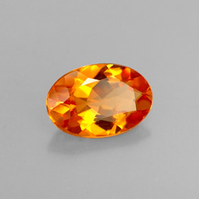 0.58 ct Orange Clinohumite Gemstone, Clinohumite Gem in Oval Facet Shape for Sale.