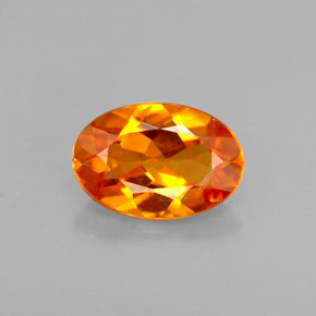 0.58 ct Orange Clinohumite Stone, Natural Clinohumite in Oval Facet Shape for Sale