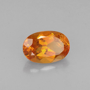 0.60 ct Orange Clinohumite Stone, Natural Clinohumite in Oval Facet Shape for Sale