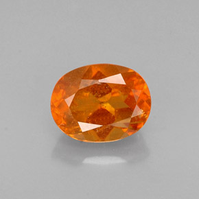 0.72 ct Orange Clinohumite Gemstone, Clinohumite Gem in Oval Facet Shape for Sale.