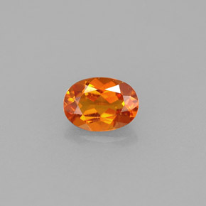 0.55 ct Orange Clinohumite Gemstone, Clinohumite Gem in Oval Facet Shape for Sale.