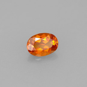 0.55 ct Orange Clinohumite Stone, Natural Clinohumite in Oval Facet Shape for Sale