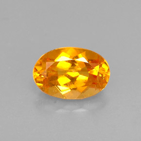 0.52 ct Orange Clinohumite Gemstone, Clinohumite Gem in Oval Facet Shape for Sale.