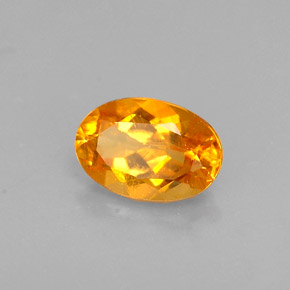 0.52 ct Orange Clinohumite Stone, Natural Clinohumite in Oval Facet Shape for Sale