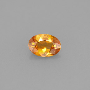 0.42 ct Orange Clinohumite Gemstone, Clinohumite Gem in Oval Facet Shape for Sale.