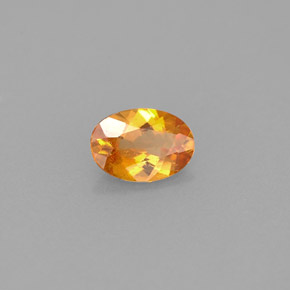 0.42 ct Orange Clinohumite Stone, Natural Clinohumite in Oval Facet Shape for Sale